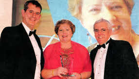 L-R are: Minister for Health, Social Services and Public Safety, Edwin Poots MLA, Esther Gishkori, runner-up in the RCN Northern Ireland Nurse of the Year Award and Dr Peter Carter, Chief Executive & General Secretary, RCN.