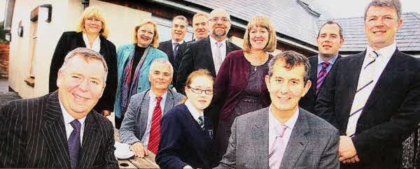 Colm McKenna (Trust Chairman), Brittnay Blackie, Edwin Poots (Health Minister) and staff from the South Eastern Health & Social Care Trust at the official opening of Glenmore Cottage