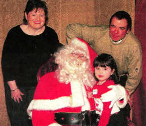 The Loney family with Santa.