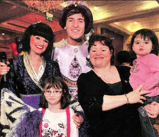 Angela Loney with Grainne and Maeve at a Christmas Show.