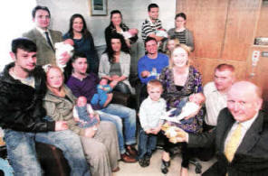 Some of the parents of babies born in the unit with Health Minister Michael McGimpsey