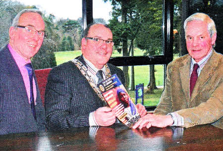 he organiser of the Trevor Guy Memorial Bursary, Stephen Gilbert, right, helps launch this year's award with the help of the secretary of the Rotary Club of Lisburn David Browne (left) and President Trevor Stewart.