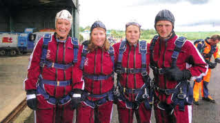 Michaela Phillips, Nicola Williams, Deborah Gibson and Paul Gibson suited, booted and ready for their skydive.