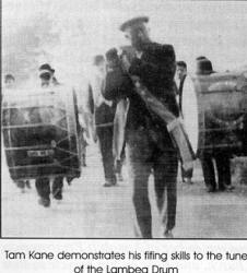 Tom Kane demonstrates his fifing skills to the tune of the Lambeg Drum