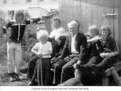 A group of local 'pigeon fanciers' awaiting their birds