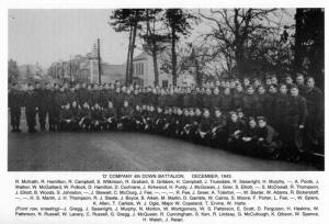 D' COMPANY 4th DOWN BATTALION. DECEMBER, 1943.R. Mcllrath, R. Hamilton, R. Campbell, S. Wilkinson, R. Graham, S. Gribben, H. Campbell, J. Truesdale, R. Seawright, H. Murphy, -, A. Poots, J. Walker, W. McGalliard, W. Pollock, D. Hamilton, D. Cochrane, J. Kirkwood, H. Purdy, J. McGowan, J. Grier, S. Elliott, -, S. McDowall, R. Thompson, J. Elliott, B. Woods, S. Johnston, -, J. Stewart, C. McClurg, J. Fee, -, -, -, R. Fee, J. Greer, A. Tolerton, -, W. Baxter, W. Adams, R. Bickerstaff, -, -, H. S. Martin, J. H. Thompson, R. J. Steele, J. Boyce, B. Aiken, M. Martin, D. Gamble, W. Cairns, S. Moore, F. Porter, L. Fee, -, W. Spiers, K. Allen, T. Carlisle, W. J. Ogle, Major W. Copeland, T. Ervine, W. Harte. (Front row, kneeling)-J. Gregg, J. Seawright, J. Murphy, N. Morton, W. Montgomery, W. S. Patterson, E. Scott, D. Ferguson, H. Haskins, W. Patterson, N. Russell, W. Lavery, C. Russell, G. Gregg, J. McQueen, R. Cunningham, S. Kerr, R. Lindsay, G. McCullough, K. Gibson, W. Spence, H. Walsh, J. Reian.
