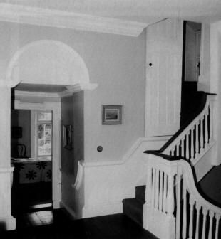 Fig. 3. The top of the main staircase, with the `hanging' stairs to the attic floor above. On the left, the little semi-dome archway.	(Photograph Ivan Strahan).