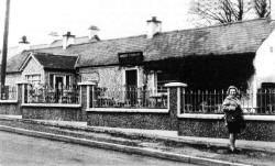 fig. 6 : Bob Stewart's in 1980. Note the addition of a porch and pebbledash, comaprison with fig.5. The person to the right is Mamie Black(nee Dugan niece of Bob and Ellen Stewart and mother of the author.