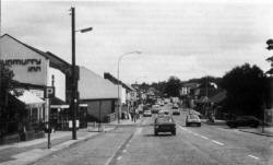 The busy village of Dunmurry on the road to Belfast