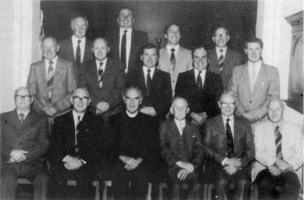 The Kirk Session, September, 1984. Back row:� Samuel Carson, Kenneth Aiken, Herbert McDonald, Beattie Johnston. Middle row:� Cyril Latimer, William Coulter, Herbert Andrews, Jon Mercer, John Wilkinson. Front row:� Harold Hamilton, Jim Walker (Clerk), Rev. H. R. Moore, Thomas Kerr, Cecil Whan, Frederick Jones.