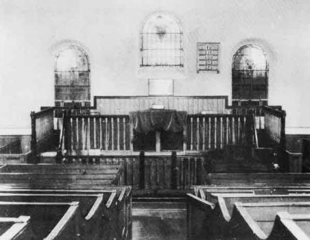 Former pulpit; and windows which were installed in 1949.