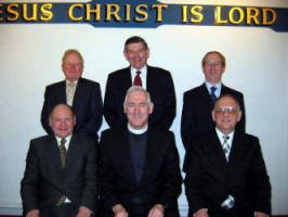 Dromara Free Presbyterian Hall Elders and Committee.  L to R: (front) Raymond Wright - Elder, the Rev. William McDermott and William Sterritt - Elder.  (back) Committee Members - John Scott, Fergie Bingham and Clifford McBurney.