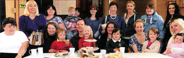 Rhona Gavin pictured serves up refreshments for some of the people who supported a Coffee Morning in aid of Cancer Research at Derryvolgie Parish Church on Friday 18th May.