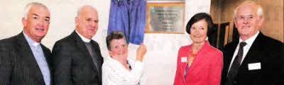 Mrs Eileen Baxter pictured unveiling a commemorative plaque celebrating the official opening of new church hall facilities at Hillsborough Presbyterian on Saturday. Looking on are the Minister, the Rev John Davey and the Presbyterian Church's Clerk of Assembly, the Rev Dr Donald Watts (left) and Mrs Ann Truesdale, Clerk of Kirk Session and Mr Derek McClelland, Project Manager (right).