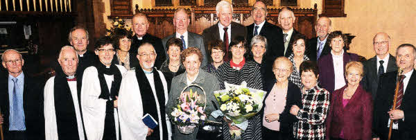 Mrs. Florence Barr and her daughter Heather with clergy, family and friends after the dedication of the wall plaque. Included are John McCullough, People's Warden (left), Colin Ross, Rector's Warden (right), Rev Canon John Budd, Rev Clifford Skillen, Rev Canon Victor Stacey and Rev David Swarbrigg, former Curate of Christ Church, Lisburn (1965-1967).