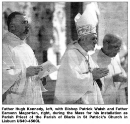 Father Hugh Kennedy, left, with Bishop Patrick Walsh and Father Eamonn Magorrian, right, during the Mass for his installation as Parish Priest of the Parish of Blaris in St Patrick's Church in Lisburn US40-456CL