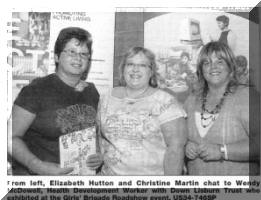 From left, Elizabeth Hutton and Christine Martin chat to Wendy McDowell, Health Development Worker with Down Lisburn Trust who exhibited at the Girls' Brigade Roadshow event. US34-746SP