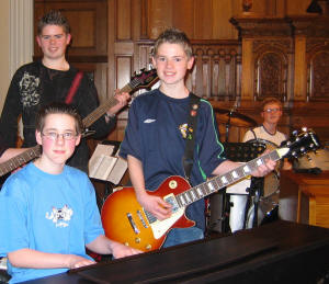 Lively music and singing at the 2005 Holiday Bible Club called “Heatwave” was led by Alan Wall - Keyboards and L to R: Adam Woods and Steven Woods - Guitar and Peter McKibben – Percussion.