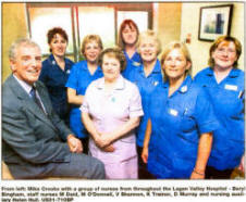 From left: Mike Crooks with a group of nurses from throughout the Lagan Valley Hospital - Beryl Bingham, staff nurses M Daid, M O'Donnell, V Shannon, K Trainor, D Murray and nursing auxiliary Helen Hull. US31-710SP 