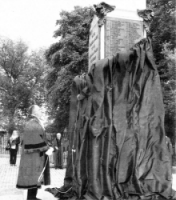 Lisburn Mayor Councillor James Tinsley unveiling the newly restored War Memorial.