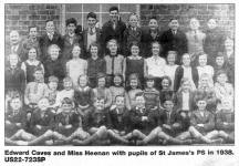 Edward Caves and Miss Heenan with pupils of St James's PS 