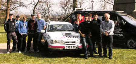 South Eastern Regional College's (SERC) Motorsports Engineering students with the rally car they helped build, pictured in Castle Gardens ahead of Saturdays Circuit of Ireland Rally.