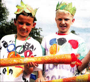 Evan Stanley and Carson Opie getting ready for the Colin Neighbourhood Partnership Family Fun Day and Carnival Parade. US3313-113A0