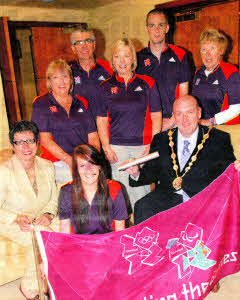 Lisburn Mayor William Leathem welcomes Olympics Games Makers from the local area to Mayor's parlour. Included are Wendy Osborne from 'Volunteer Now' along with Games Makers Chloe Sudlow, Lynn Bunting, Stephen Gilmore, Ann Cully, David Scott and Brenda Houston. INB137-GAMES