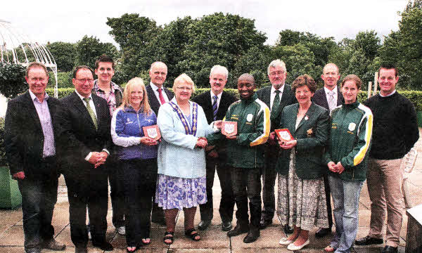 At the reception are (I-r) Ian MacDonnell, Lisnagarvey Hockey Club; Cees Sluyk, Celtic Cup Tournament Director; John Wright; South African Hockey Team; Susie Elms, Scottish Hockey Team; Jim Rose, Director of Leisure Services; Deputy Mayor, Councillor Margaret Tolerton; Chairman of the Council's Leisure Services Committee, Councillor Thomas Beckett; Moabi Malebye, South African Hockey Team; Dennis Millar, Chairman of the Irish Hockey Association; Dorothy Hull, Irish Hockey Association; Nick Harness, Sports Council, Northern Ireland; Kate Temple-Jones and P.J. Van Roojen; South African Hockey Team.