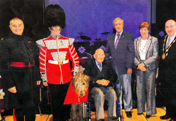 Pictured at the Irish Guards Concert held at Lagan Valley Island for the Mayor's Charity `Stepping Stones' are (l-r) Major Wayne Hopla, Drummer Steed; `Conmael', Irish Guards Mascot; Mr John Mackin, Veteran Irish Guardsman; Councillor Uel Mackin; Mrs Jennifer Mackin; The Mayor, Alderman William Leathem and Mayoress, Mrs Kathleen Leathem.