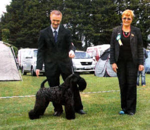 Mark with Coby and the judge at a recent win In Dublin.