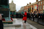 The Mayor, Councillor Trevor Lunn lays a wreath at Lisburn Cenotaph.