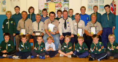 L to R: David Elliott, Joss Toombs, Martin Young, Noel Irwin (DC), Alan Jess and Mavis Kirk pictured with 1st Anahilt Cubs and Scouts.