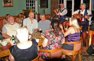 Drew Rowan (left) and Noel McMaster of Bakerloo Junction pictured on Friday 1st September - the first night of the new season�s Friday night sessions at the Ivanhoe Hotel, Carryduff.  Included in the photo is former Lisburn man Nelson Williams (left).