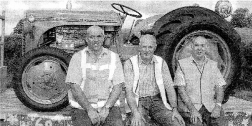 Celebrating the 60th Anniversary of the Ferguson TE20 at the Homestead Event at Growell were Robert Kerr, David Poots and Eric Jess (Chairman of the Celebration Committee). BL34-210EB