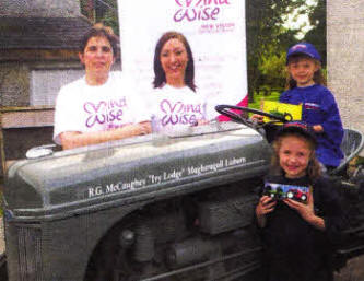 Jackie McCaughey, NI Representative of the Ford & Fordson Association, Victoria Brown, MindWise Volunteer, Chloe Finlay (Back) and Courtney Finlay (Front) get ready for the Ford & Fordson Annual Indoor Tractor Show at Trummery Sales Arena on 16th and 17th October 2009.