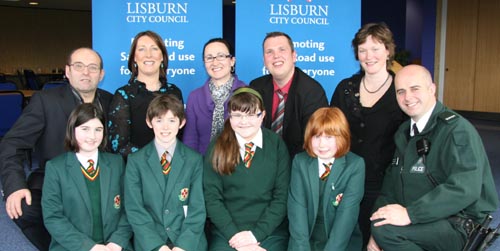 The third prize winning team from Friends’ Prep Department L to R: Sarah Mills, Josh Victor, Olivia Baxter and Emma Gordon. (back row) John Palmer (LRSC Treasurer), Patricia England (LRSC), Jackie Montgomery (P7 teacher), Andrew Ewing (LRSC Vice Chairman), Karen Mawhinney (National Standard Cycle Instructor) and Constable Stevie Wright (Hillsborough RPU).