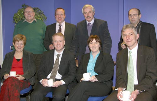 Enjoying a cup of tea while the judges check the quiz papers are L to R: Ann Thompson (Ballycarrickmaddy PS Principal), Colin Elliott (Brownlee PS Principal), Councillor Jennifer Palmer and Alan Palmer (Old Warren PS Principal). (back row) George Cromie (LRSC Secretary), Paul Good (Meadow Bridge PS Principal), Harry Stewart (Largymore PS Principal) and John Palmer (LRSC Treasurer).