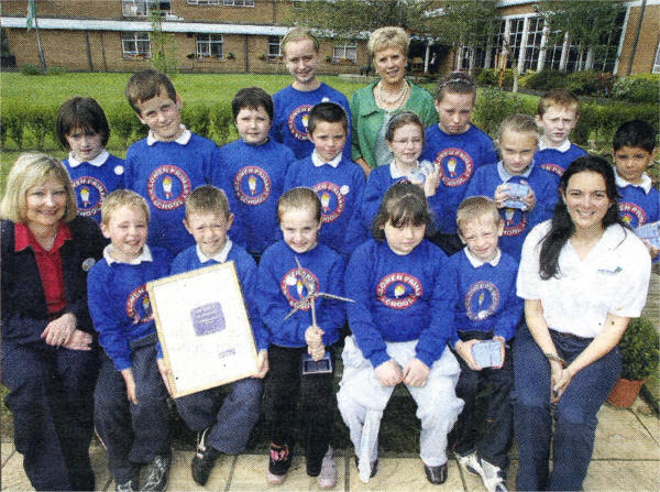 Front row L-R: Anne Broom,Tesco Lisburn, Dylan Morrison, Jason Hawthorn, Samantha Morrow, Chloe Rainey, Lee Hawthorne, Nicola Chang, Action Renewables. Middle row L-R: Emilie Williams, Matthew Gifford, Jacob Wilson, Jordan Kelly, Louise Tracey, Rebecca Green, Taylar Shaw, Aaron Finlay, James Faloon. Back row: Anna Millar and Mrs Fiona Crory, Principal.