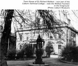 Town House of Sir Richard Wallace - now part of the Lisburn Technical College - note the Wallace Fountain in the foreground. (Photo: Lisburn Museum)