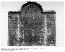 Tablet on the north-west corner of the Ulster Buildings - marking the site of the first house to be rebuilt following the Great Fire of 1707. (Photo: Lisburn Museum)