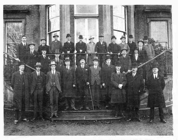 Members and officials of Lisburn Urban ouncil pictured outside Lisburn Technical School in 1924. Mr. Thomas Sinclair, chairman. is fifth from left in the front row and fourth from left in the same row is Mr. Thomas M. Wilson. Town Clerk. E450.