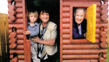 Marie Cowan (L) Chair of the Integrated Education Fund and Baroness May Blood, the Fund's Campaign Chair, explore the fun facilities at the new community playgroup at Rowandale Integrated Primary School with some future pupils. Pic by Declan Roughen.