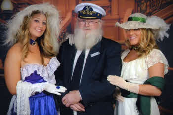 Samuel Rollins dressed as Captain Edward John Smith during his recent cruise to remember those who perished in the Titanic disaster. Samuel is pictured with other passengers who dressed up to mark the 100th anniversary.